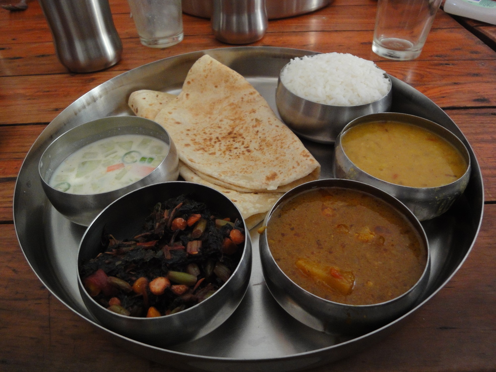 An Indian thali is best enjoyed when eaten with your hand. 